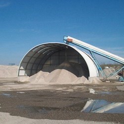 half open Frisomat omega hangar on a flood wall for bulk storage