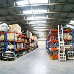pallet racks in a omega used as warehouse for storage