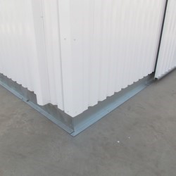 The building is sealed to the floor with a galvanized profile sheet
